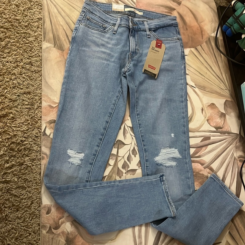 Levi’s 711 skinny light denim jeans in distress washed blue, NWT
